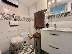Appartements Chez BEN avec tout le confort clim wifi Netflix gratuit : photos des chambres