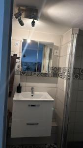 Appartements Chez BEN avec tout le confort clim wifi Netflix gratuit : photos des chambres