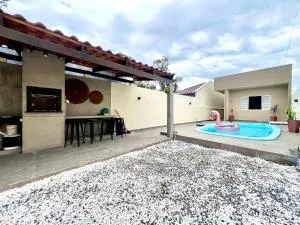 Casa com piscina , ar condicionado e churrasqueira no balneário Eliana - Brejatuba