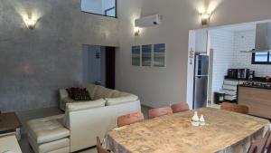 50m praia Cond pé na areia Alto padrao 4 suites Segur 24h Costa do sol Guaratuba Bertioga prox Riviera