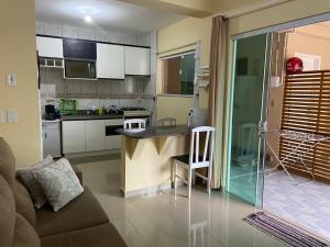Apartamento térreo 150m da praia