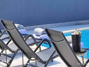 Modern home with swimming pool and sea view