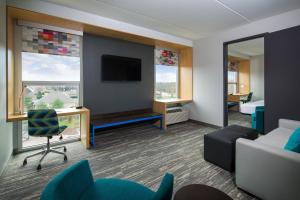 Aloft, Suite, 1 King, Alternate bed: sofa bed room in Aloft Louisville East