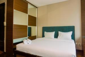 Homey and Minimalist Studio Room at GP Plaza Apartment By Travelio