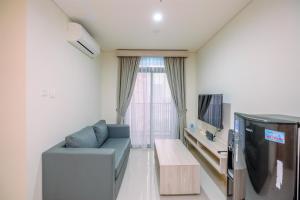 Comfort 1BR Apartment at Pejaten Park Residence By Travelio