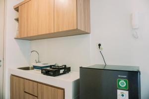 Cozy Studio at High Floor Tokyo Riverside PIK 2 Apartment By Travelio