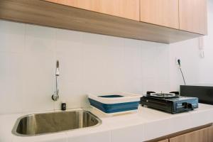 Cozy Studio at High Floor Tokyo Riverside PIK 2 Apartment By Travelio