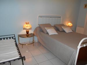 Appartements Jardin du Bourg : photos des chambres