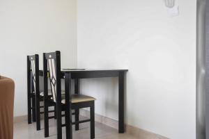 Comfort 1BR with Room Office at Menteng Park Apartment By Travelio