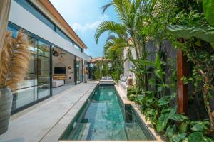 Villa Isly - Stylish 2BR Villa with BBQ, Rooftop and Beach Nearby