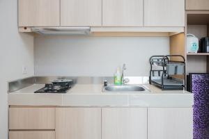 Minimalist and Comfort 1BR at B Residence By Travelio
