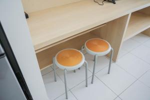 Warm and Cozy Studio at Casa De Parco Apartment By Travelio