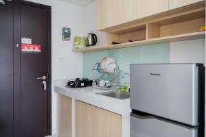 Warm and Cozy Studio at Casa De Parco Apartment By Travelio