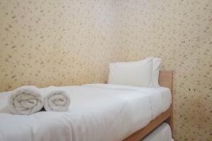 Minimalist and Combine 2BR at Green Pramuka City Apartment By Travelio