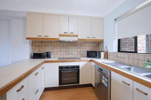 The Poolside Perch - A Breezy Balcony Gem