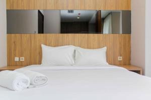 Nice and Enjoy 1BR at Sudirman Suites Apartment By Travelio