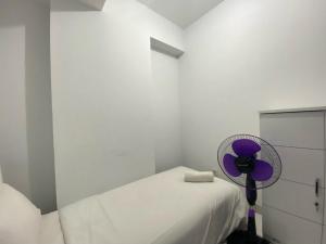 Bright and Relaxing 2BR Apartment at Mekarwangi Square Cibaduyut By Travelio