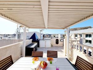 Charming Upper Bungalow with Terrace and Communal Pool in Torrevieja