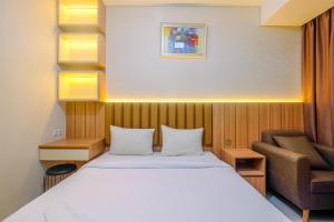 Homey and Stylish Studio Room at Transpark Cibubur Apartment By Travelio