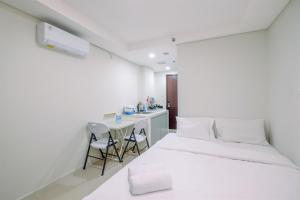 Fancy and Nice Studio at Daan Mogot City Apartment By Travelio