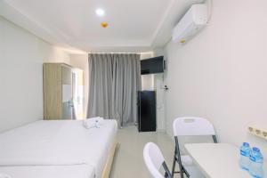 Fancy and Nice Studio at Daan Mogot City Apartment By Travelio
