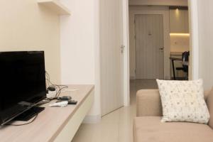 Comfort 2BR at Grand Kamala Lagoon Apartment By Travelio