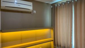 Nice and Comfort 1BR at Sky Terrace Apartment By Travelio