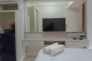 Relax Studio at Vida View Makassar Apartment By Travelio