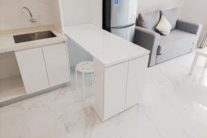 Nice and Elegant 2BR at Sky House BSD Apartment By Travelio