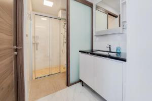 Nice and Elegant 2BR at Sky House BSD Apartment By Travelio