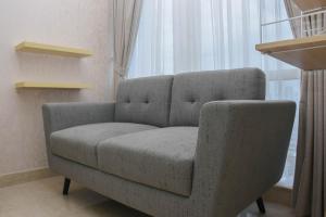 Fully Furnished with Cozy Design Studio at Menteng Park Apartment By Travelio