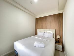 Deluxe 2BR at Parahyangan Residence By Travelio