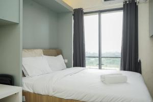 Stunning Studio Apartment at Sky House BSD By Travelio