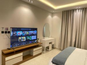 استوديو مودرن مع جاكوزي ودخـول ذاتي