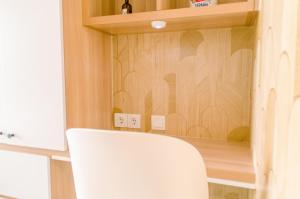 Cozy and Minimalist Studio at Sky House BSD Apartment By Travelio