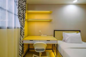 Comfy and Minimalist Studio at Evenciio Margonda Apartment By Travelio