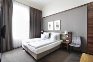 Family Room (2 Adults + 2 Children) room in Golden Tulip Krakow City Center