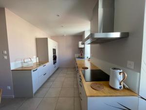 Appartements Appart du faubourg : photos des chambres