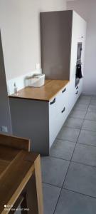 Appartements Appart du faubourg : photos des chambres