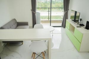 Fully Furnished and Tidy 2BR at Sky House BSD Apartment By Travelio