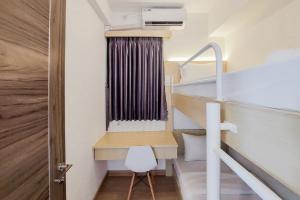 Fully Furnished and Tidy 2BR at Sky House BSD Apartment By Travelio