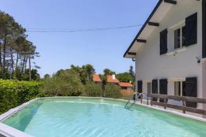 Maisons de vacances Maison ensoleillee avec piscine privee a Moliets-et-Maa : photos des chambres