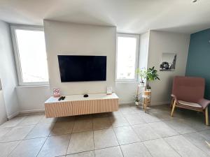 Appartements Appart du faubourg : photos des chambres