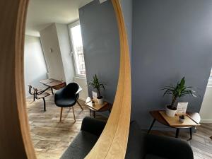 Appartements Appart du faubourg : photos des chambres