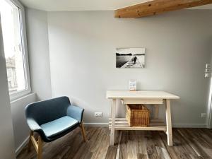 Appartements Appart du faubourg : photos des chambres