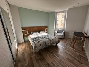 Appartements Appart du faubourg : photos des chambres