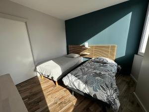 Appartements Appart du faubourg : photos des chambres