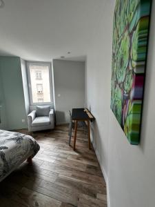 Appartements Appart du faubourg : photos des chambres