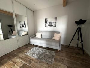 Appartements Appart du faubourg : photos des chambres