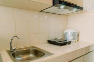 Nice and Cozy Studio at Serpong Greenview Apartment By Travelio